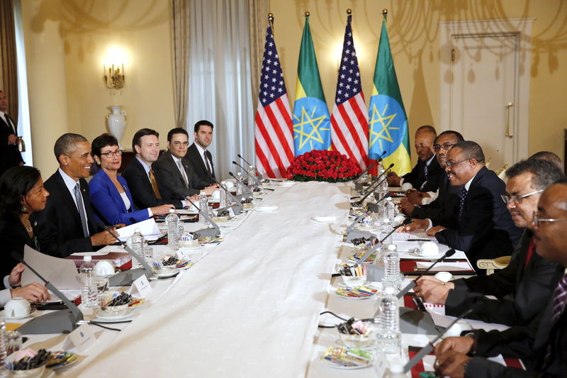 © Reuters. U.S. President Obama and his delegation, including NSA Rice, sit down to a bilateral meeting with Ethiopia's Prime Minister Desalegn at the National Palace in Addis Ababa, Ethiopia