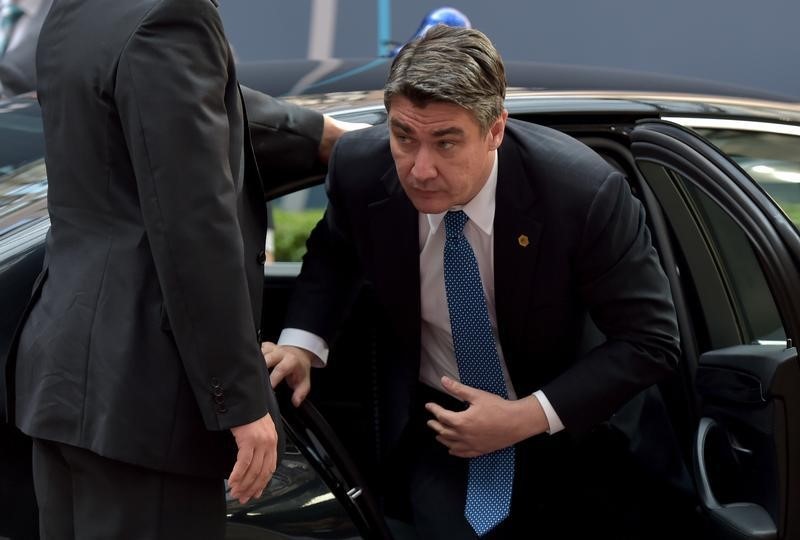 © Reuters. Croatia's PM Milanovic arrives at the EU Council headquarters at the start of a European Union leaders summit in Brussels, Belgium