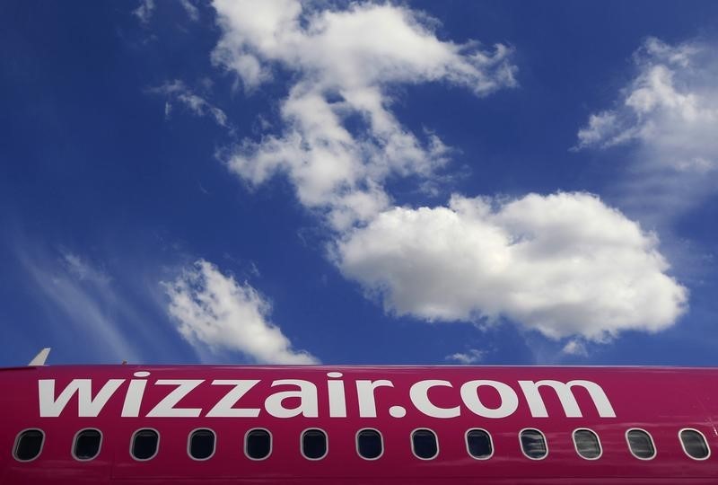 © Reuters. Wizz Air's logo is seen on an aircraft parked at Budapest Airport