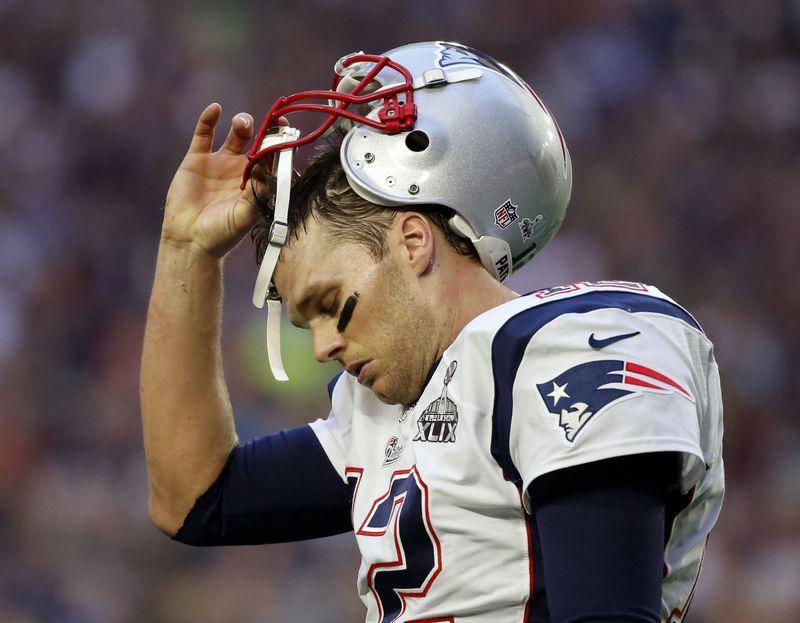 © Reuters. File photo of New England Patriots quarterback Tom Brady walking to the sidelines after throwing an interception in the first quarter against the Seattle Seahawks during the NFL Super Bowl XLIX football game in Glendale