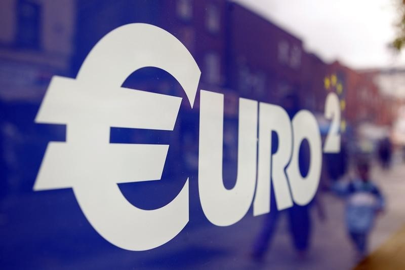 © Reuters. A Euro sign is seen in the window of a discount store on Moore Street in Dublin