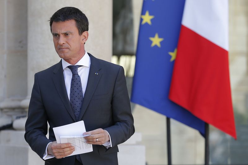 © Reuters. VALLS TENTE DE RASSURER LES ENTREPRENEURS