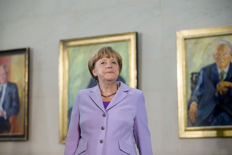 © Reuters. German Chancellor Angela Merkel receives diplomatic corps in the Chancellery in Berlin
