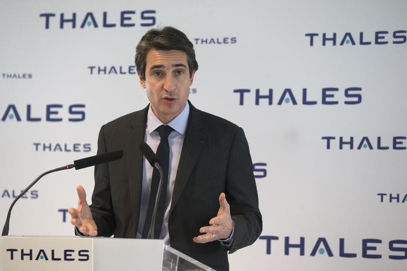 © Reuters. Patrice Caine, newly appointed Chairman and Chief Executive of Thales, speaks during the presentation of the company's 2014 results at their headquarters in La Defense business district  near Paris