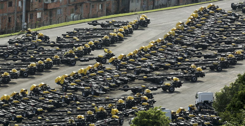 © Reuters. Parts of the new Mercedes-Benz trucks are seen at a parking lot close to the Mercedes-Benz factory in Sao Bernardo do Campo