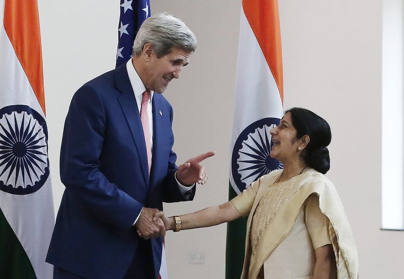 © Reuters. File photo of U.S. Secretary of State Kerry shaking hands with India's External Affairs Minister Swaraj before the start of their meeting in New Delhi