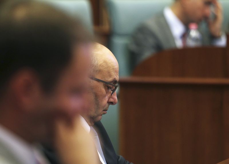 © Reuters. Kosovo's Prime Minister Isa Mustafa attends a parliament session in Pristina, Kosovo