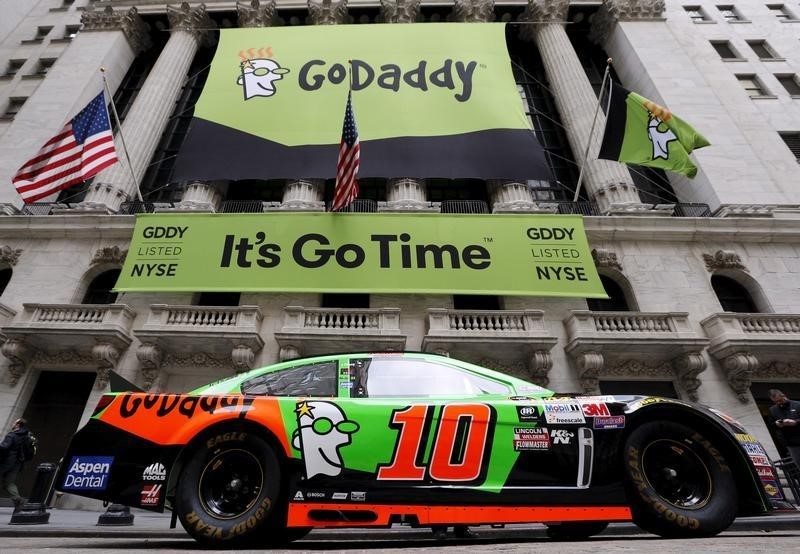 © Reuters. NASCAR vehicle is seen parked out front during web hosting company GoDaddy's initial public offering at the New York Stock Exchange