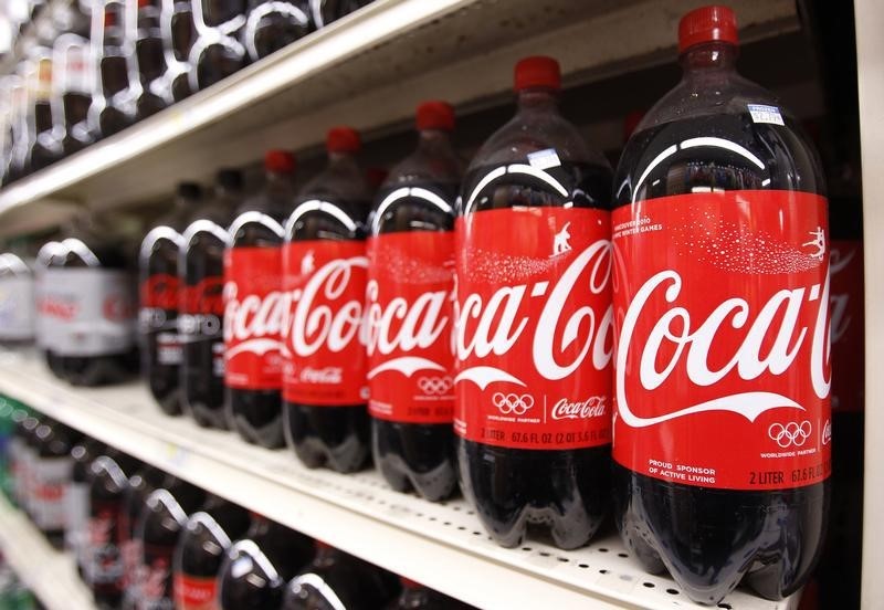 © Reuters. Bottles of Coca Cola are seen in a store display in New York