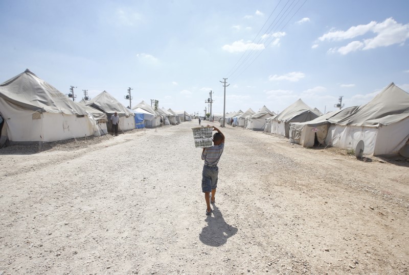 © Reuters. وزير العمل: تركيا لن تمنح اللاجئين السوريين حق العمل