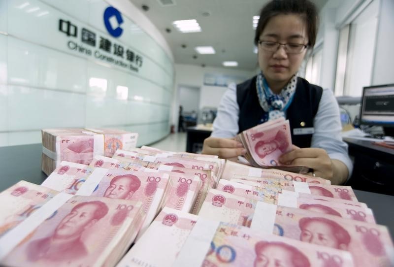 © Reuters. El FMI dice que nuevo mecanismo de cambio del yuan es un 