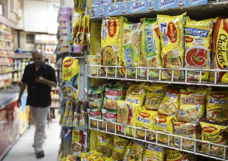 © Reuters. Packets of Nestle's Maggi instant noodles are seen on display at a grocery store in Mumbai