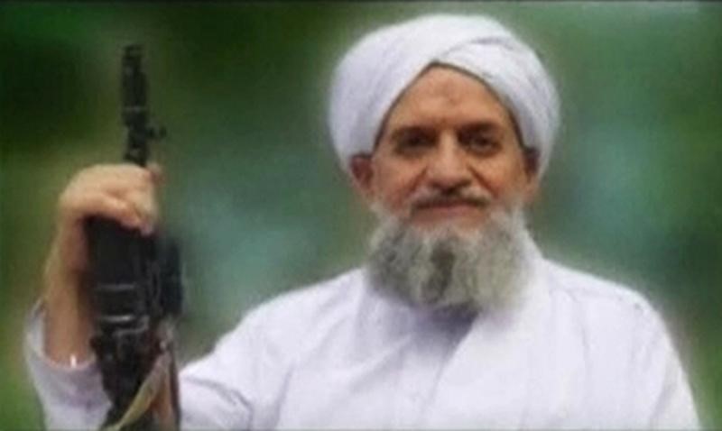 © Reuters. A photo of Al Qaeda's new leader, Egyptian Ayman al-Zawahiri, is seen in this still image taken from a video released on September 12, 2011