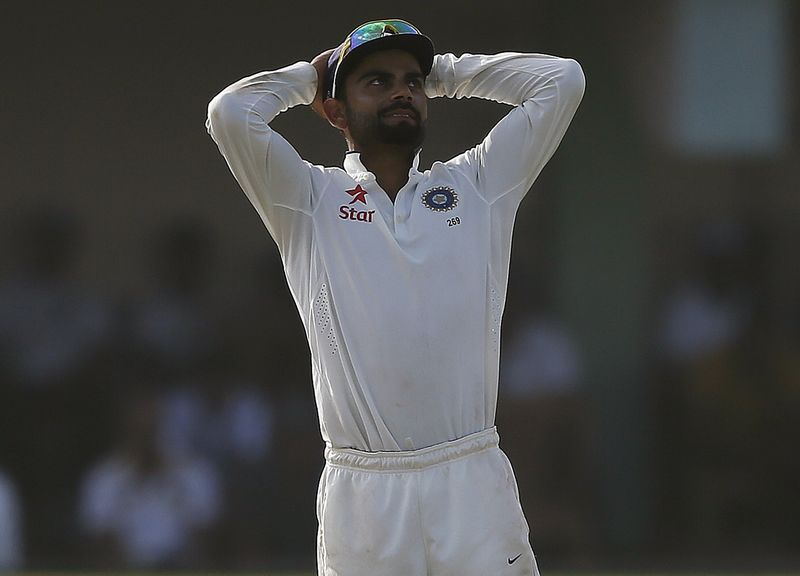 © Reuters. India's captain Kohli reacts during the third day of their first test cricket match against Sri Lanka in Galle