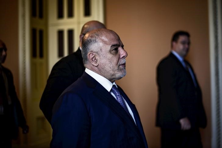 © Reuters. Iraqi Prime Minister al-Abadi walks to a meeting with the Senate leadership at the U.S. Capitol in Washington