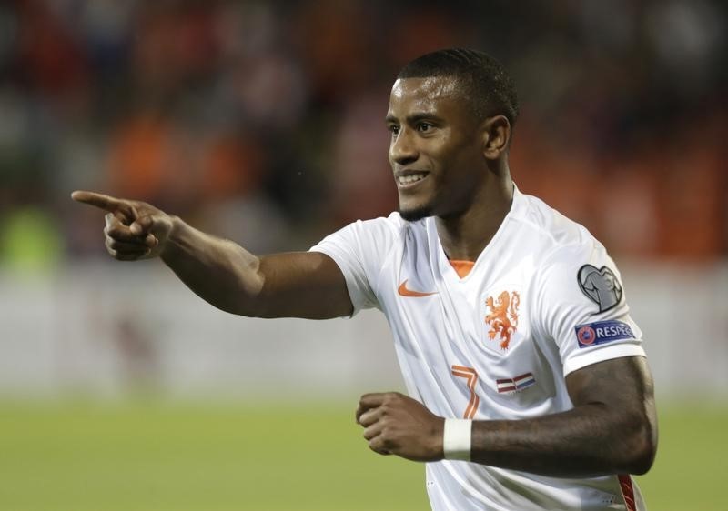 © Reuters. Netherlands' Narsingh celebrates his goal against Latvia during a soccer Euro 2016 qualification match in Skonto stadium in Riga