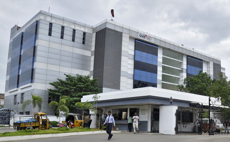 © Reuters. A security guard walks in front of the headquarters of GVK Biosciences in Hyderabad