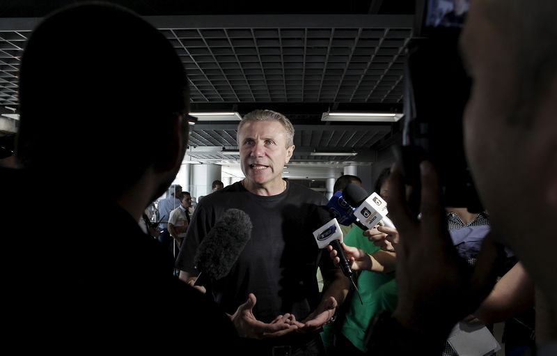 © Reuters. International Olympic Committee (IOC) member and pole vault legend Sergey Bubka of Ukraine, speaks to the press upon his arrival at the Juan Santamaria international airport in Alajuela