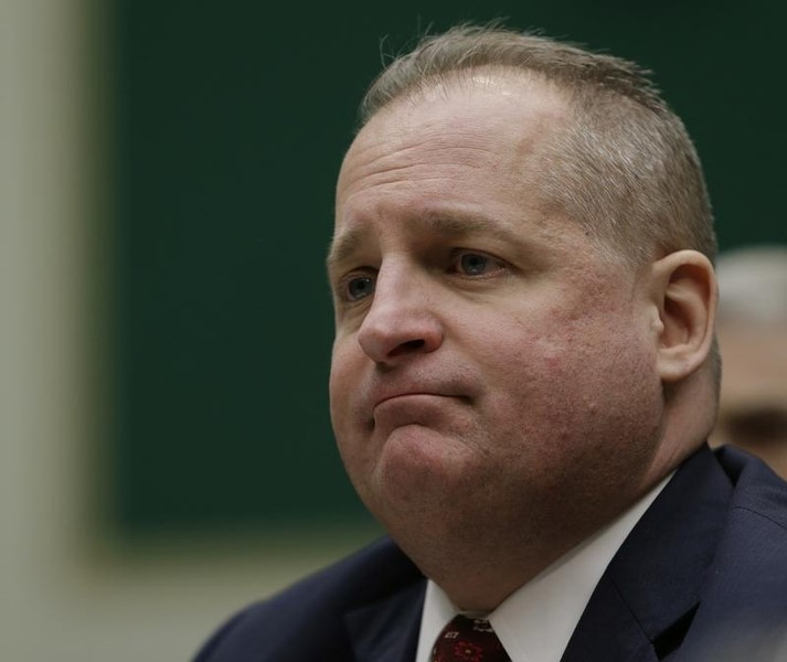 © Reuters. Vice-president and CFO of Target Brands Incorporated John Mulligan testifies before the House Energy and Commerce Subcommittee on protecting consumer information in Washington