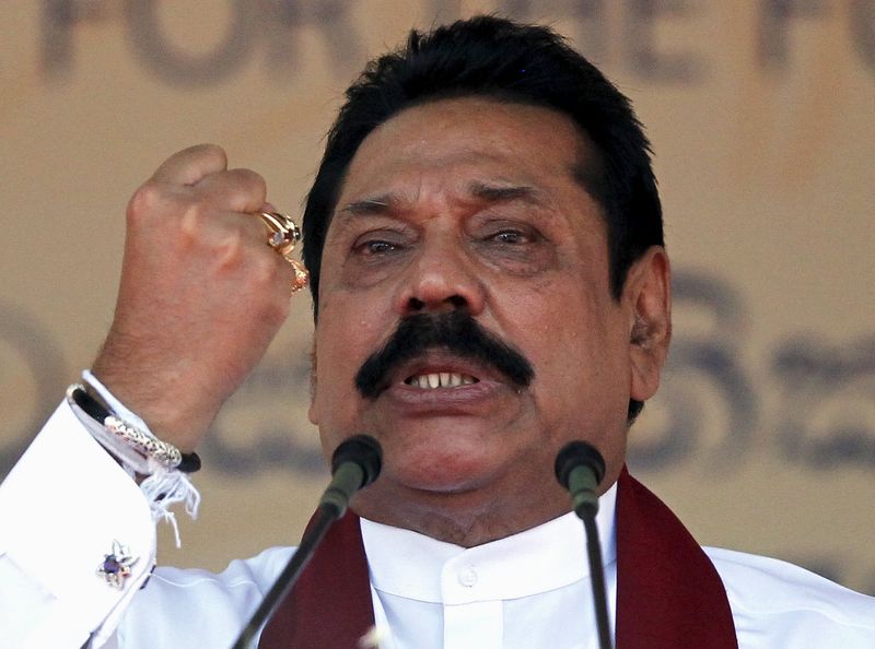 © Reuters. Sri Lanka's former president Rajapaksa, who is contesting in the upcoming general election, speaks during the launch ceremony of his manifesto, in Colombo 