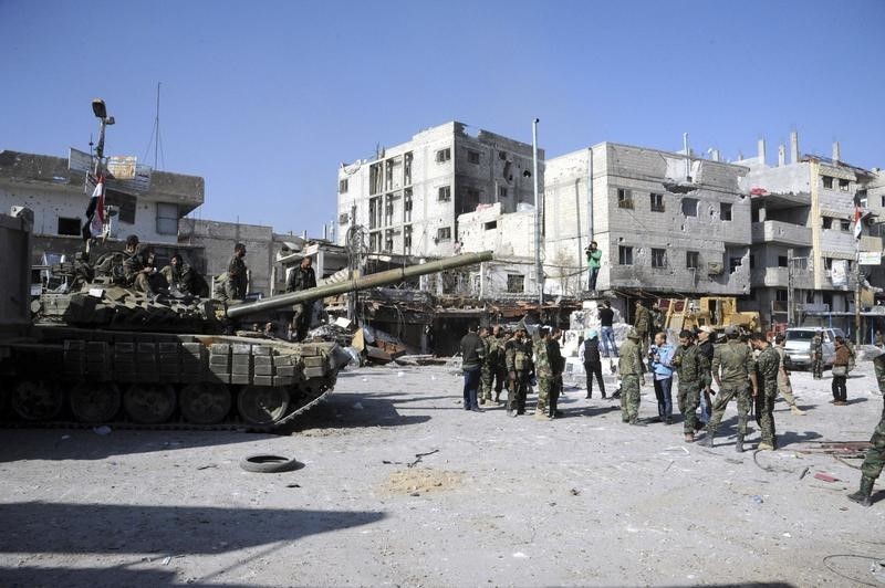© Reuters. المرصد السوري: الحكومة السورية تشن هجوما مضادا على سهل إستراتيجي