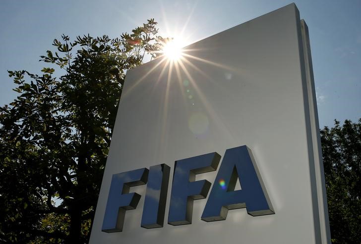 © Reuters. The logo of FIFA is seen in front of its headquarters in Zurich 