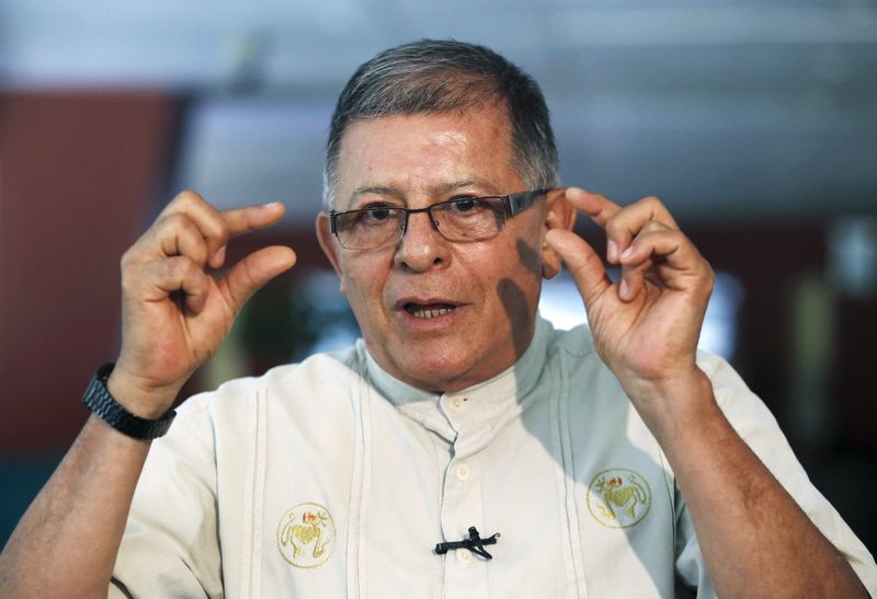 © Reuters. Leading FARC negotiator Granda gestures while speaking to Reuters in Havana