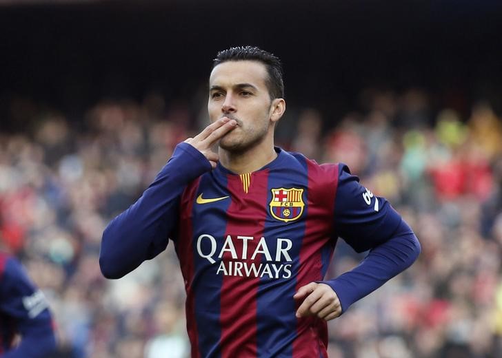 © Reuters. Barcelona's player Pedro Rodriguez celebrates a goal against Cordoba during their Spanish First division soccer match at Camp Nou stadium in Barcelona