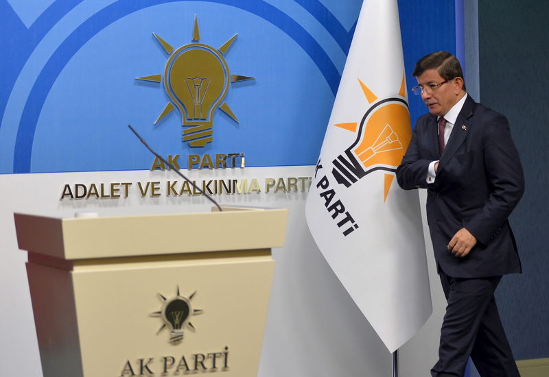 © Reuters. Turkey's Prime Minister Davutoglu arrives for a news conference at his ruling AK Party headquarters in Ankara, Turkey