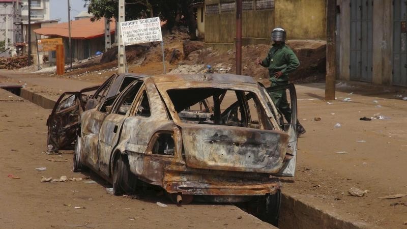 © Reuters. الحكومة والمعارضة في غيينا توقعان اتفاقا قبل انتخابات اكتوبر
