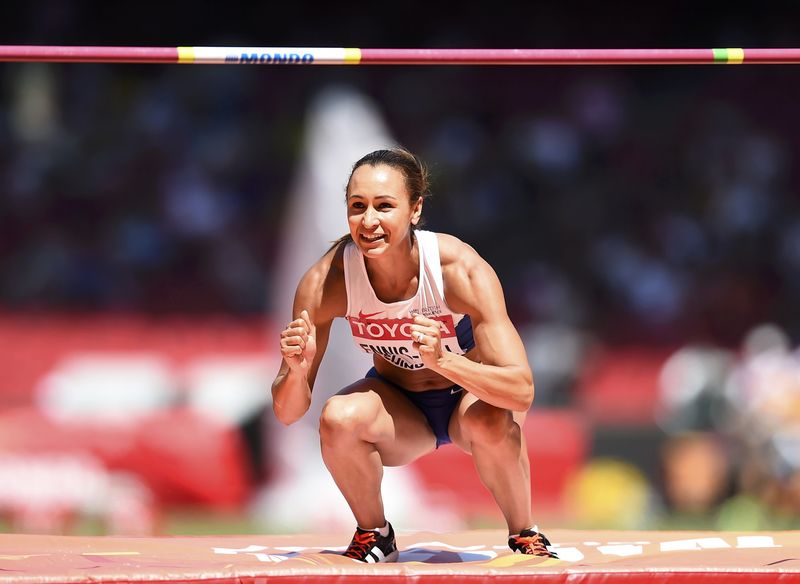 © Reuters. Ennis-Hill of Britain reacts as she competes in the high jump event of the women's heptathlon during the 15th IAAF World Championships at the National Stadium in Beijing