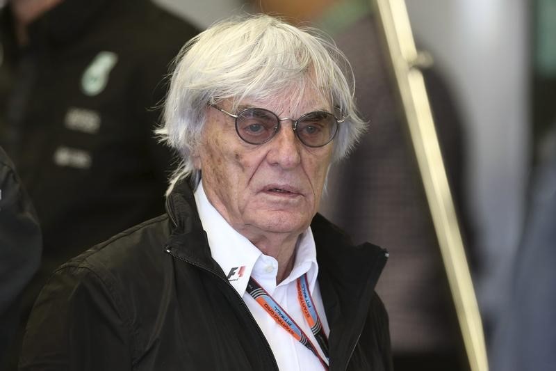 © Reuters. Formula One supremo Bernie Ecclestone walks in the Mercedes team garage during the third practice session of the Canadian F1 Grand Prix in Montreal