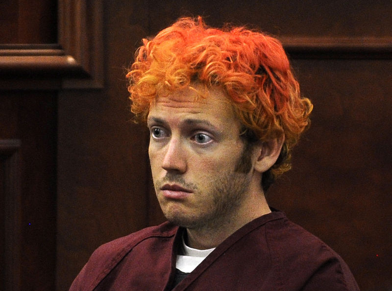 © Reuters. Colorado shooting suspect James Eagan Holmes makes his first court appearance in Aurora