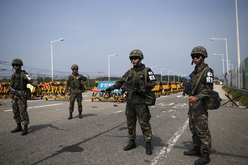 © Reuters. Las dos Coreas alcanzan un acuerdo para poner fin a tensiones