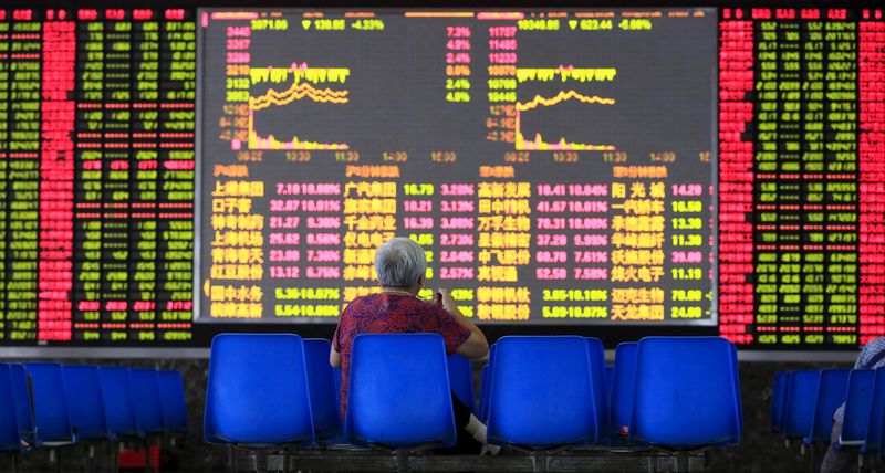 © Reuters. LA BOURSE DE SHANGHAI RECULE ENCORE DE PLUS DE 7%