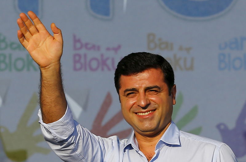 © Reuters. Demirtas greets the crowd during a peace rally in Istanbul