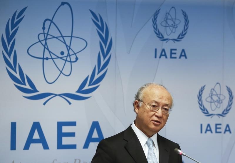 © Reuters. IAEA Director General Amano addresses a news conference after a board of governors meeting at the IAEA headquarters in Vienna