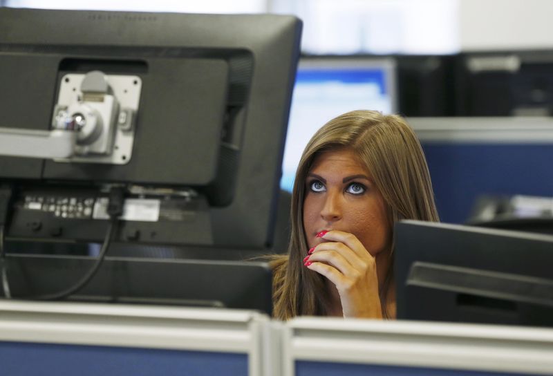 © Reuters. A risk manager works on the trading floor at IG Index in London