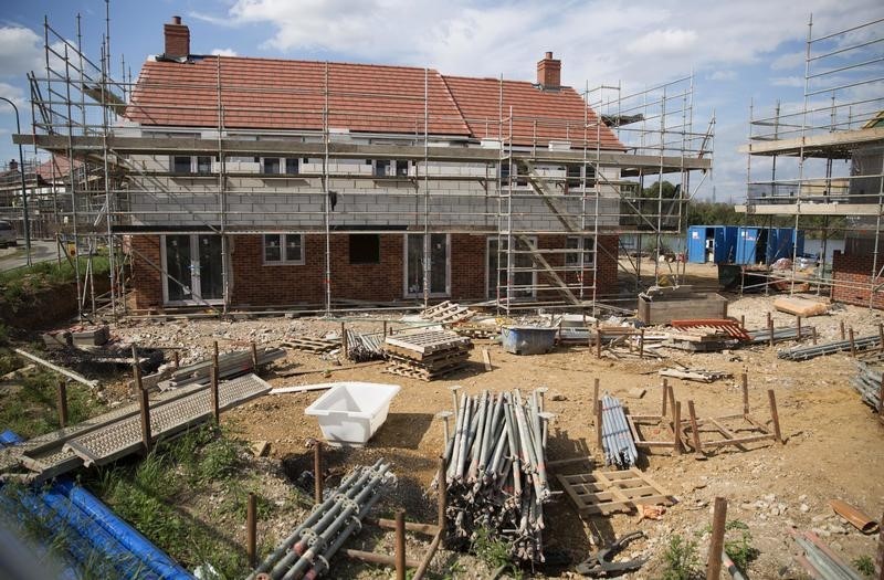 © Reuters. Homes are seen under construction at a Persimmon site in Dartford