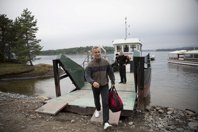 © Reuters. NATO Secretary-General Stoltenberg leaves the Labour Youth Organisation (AUF) summer camp after staying the night on the island in Utoya