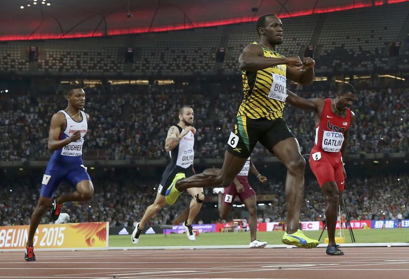 © Reuters. Bolt gana por cuarta vez el título mundial de los 200 metros