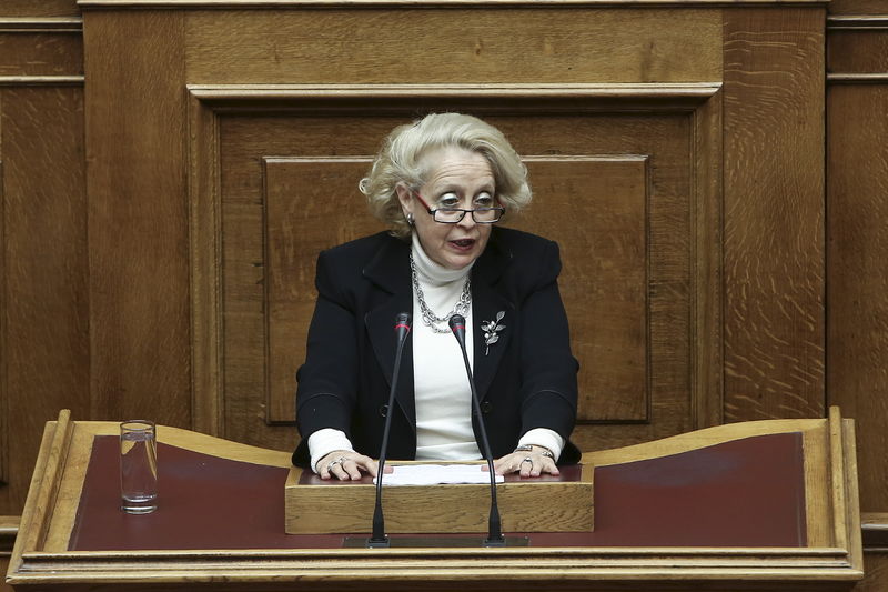 © Reuters. Supreme Court judge Thanou addresses a parliamentary session on the occasion of the International Women's Day in Athens