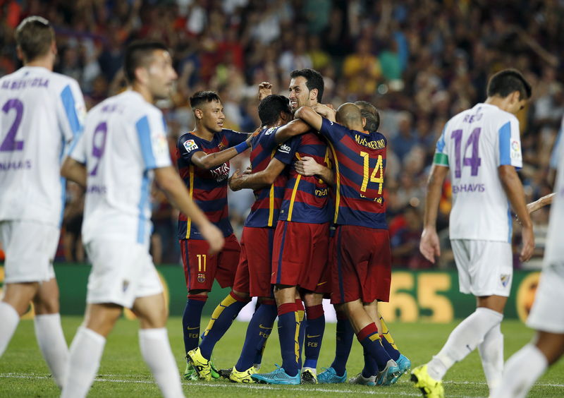 © Reuters. برشلونة يفلت من فخ ملقة بفضل أول أهداف فرمالين
