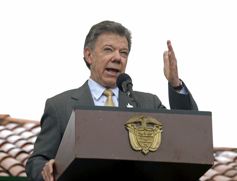 © Reuters. Santos speaks during the commemoration of the 196th anniversary of the Colombian Army, in Bogota