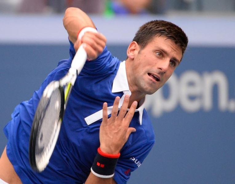 © Reuters. ديوكوفيتش يشق طريقه بسهولة نحو الدور الثاني في أمريكا المفتوحة
