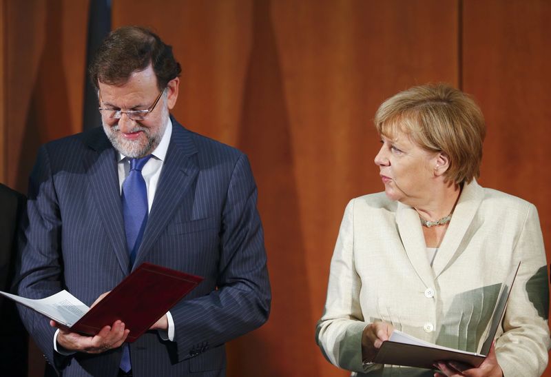 © Reuters. Rajoy y Merkrl piden que la UE diga qué países de refugiados son seguros