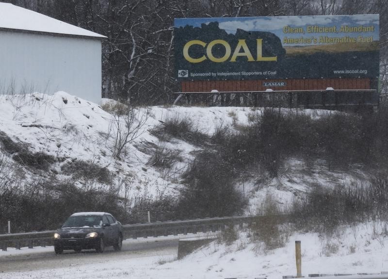 © Reuters. A billboard carries a message for the coal industry near Wheeling, West Virginia