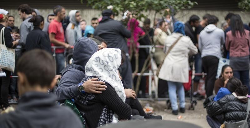 © Reuters. Presidente de Consejo Europeo pide distribuir al menos a 100.000 refugiados