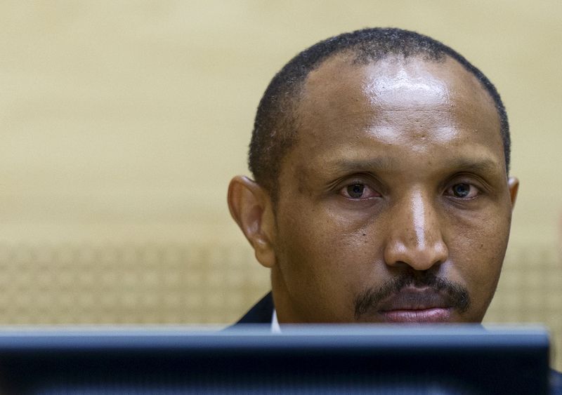 © Reuters. Congolese militia leader Ntaganda sits in the courtroom of the ICC during the first day of his trial at the Hague in the Netherlands