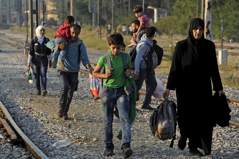 © Reuters. La UE confirma un plan para elevar las cuotas para albergar refugiados